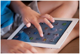 Article Image Kid on iPad following digital parenting tips